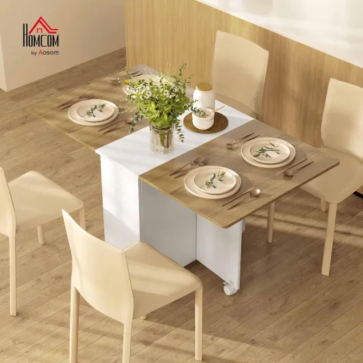 Table à Manger Pliante sur roulettes, Table de Cuisine pour 6 Personnes avec 2 abattants, 2 tiroirs et 2 placards, pour Petits espaces, 140 x 76 x 74 cm, Blanc et Bois Naturel