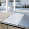 Plan de travail extérieur pour cuisine d'été : matériaux qui tiennent face aux UV, à la pluie et au gel